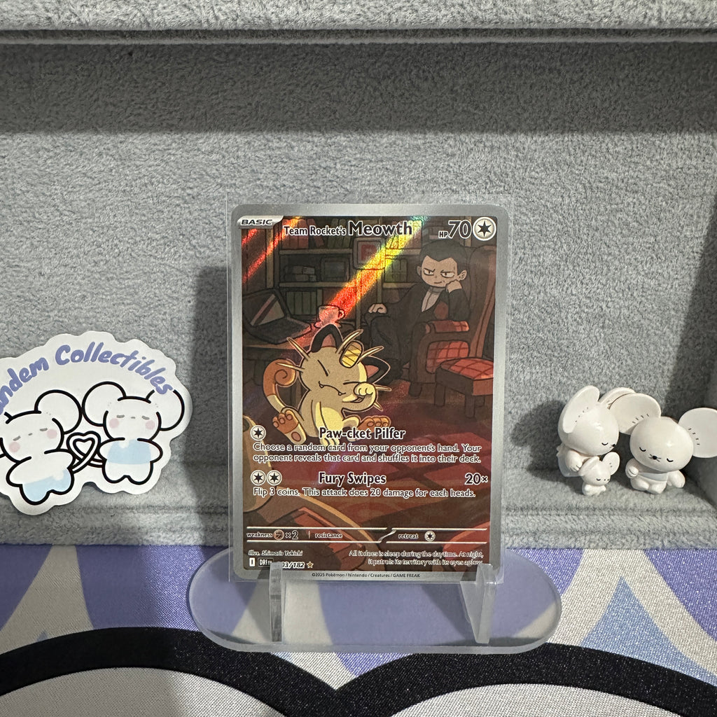 Team Rocket's Meowth 203/182 NM