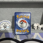 Team Rocket's Meowth 203/182 NM